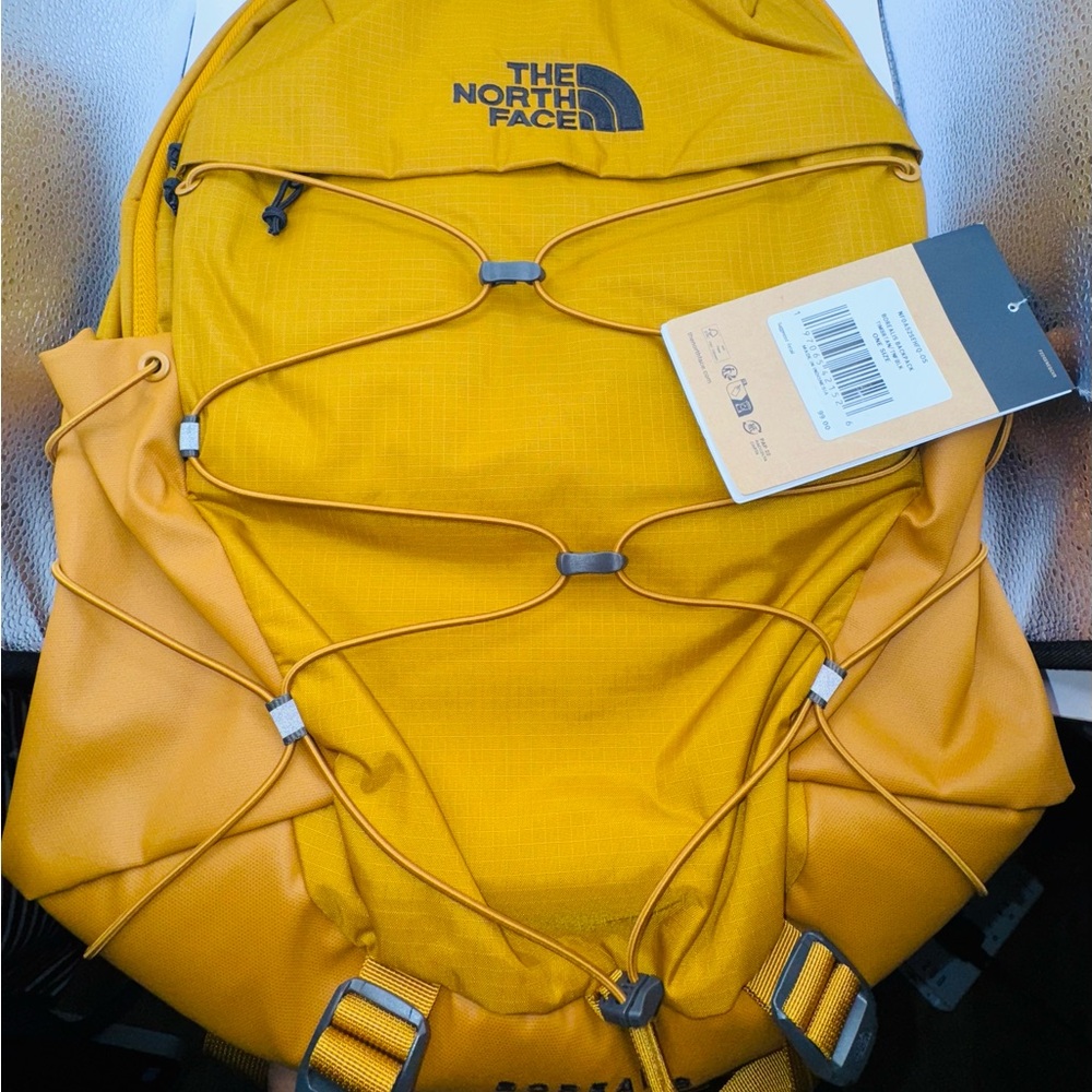 The North Face Mustard Backpack with Bungee Cord